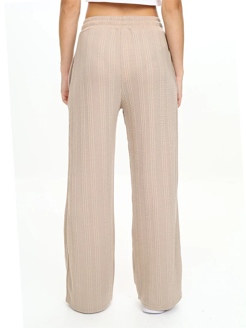 دينوكيدس بنطلون رياضي واسع الساق للبنات باللون البيج الأساسي